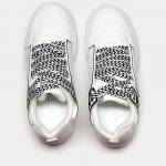 Кроссовки с графичным дизайном из эко кожи белого цвета с чёрно-белыми шнурками